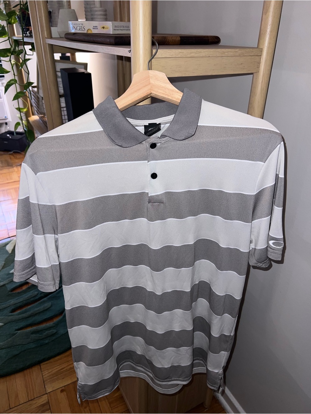 Oakley Men's Gray and White Striped Polo size Medium